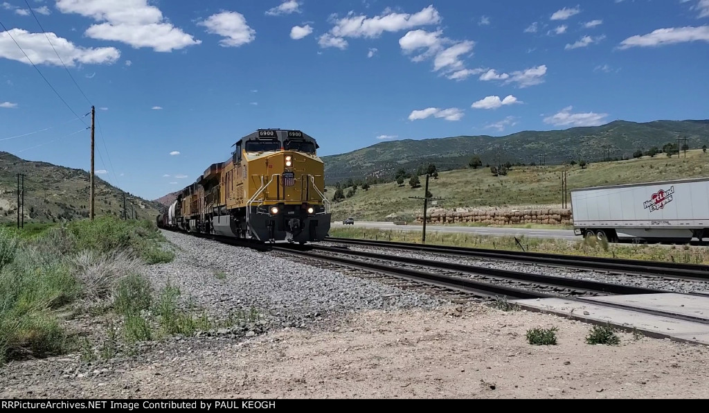 UP 6900 Climbs The Grade Heading Towards Soldier Summit Utah with US-6 To the Right of Her.